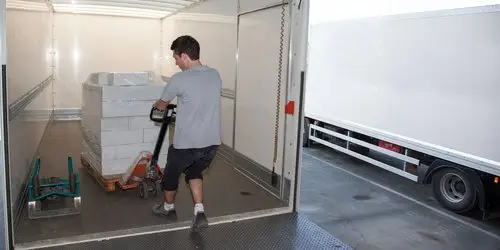 Technician working at a loading dock
