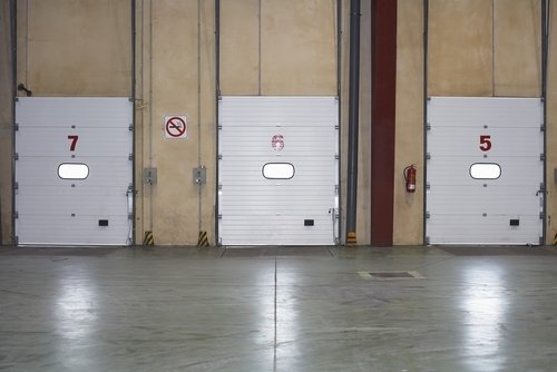 Interior loading dock doors and safety area